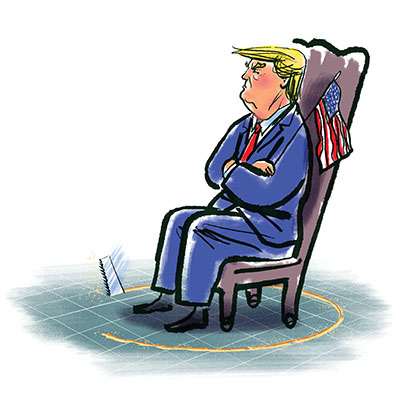 Trump sitting in chair